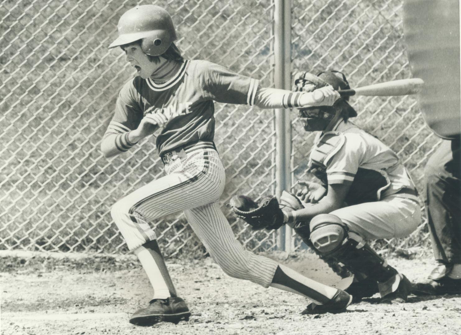 A swing - and a big hit, Mike Leonard, Oakville Wheelabrator third baseman, gives it all he's got during yesterday's action in Star- CNE peewee baseball tournament, at Exhibition Place