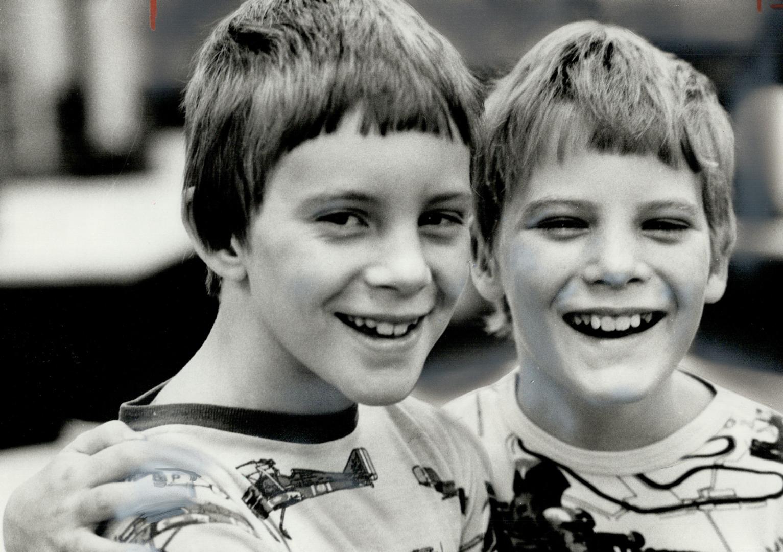 Eight-Year-Old Steven Veals (left) plans to buy himself and his brother, Scott, 9, dreams bikes with the $2,000 he won in The Star's Jokers Wild conte(...)