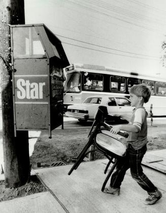 Sometimes four legs are better than two, James Crawley, 7, had his feet on the ground yesterday even if a Star newspaper vending box at Queen St. E. and Woodbine Ave. didn't