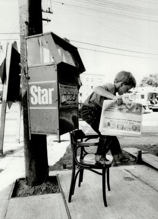 Sometimes four legs are better than two, James Crawley, 7, had his feet on the ground yesterday even if a Star newspaper vending box at Queen St. E. and Woodbine Ave. didn't