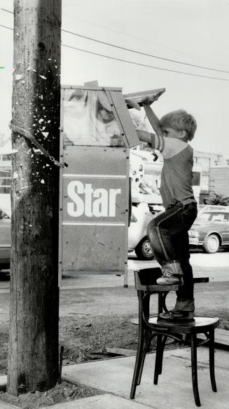 Sometimes four legs are better than two, James Crawley, 7, had his feet on the ground yesterday even if a Star newspaper vending box at Queen St. E. and Woodbine Ave. didn't