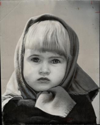 Wistful appeal in this little girl's eyes speaks for the hundreds of Toronto's less fortunate children whom Santa claus must pass by unless you help. (...)