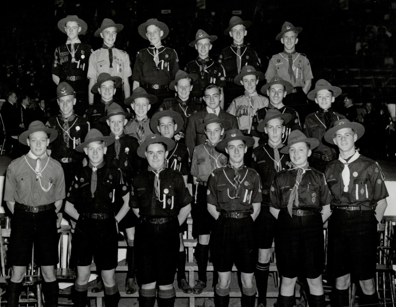 These Boy Scouts speed like mercury on many a quick job, and take part in two Pageants of Flags