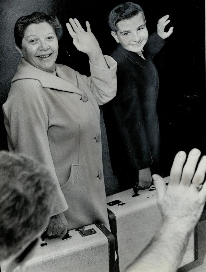 Winner Larry Turkish and Mother Wave goodbye as they set out of Disneyland visit