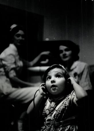 Deaf child hears music for the first time at Hospital for Sick Children clinic for the deaf