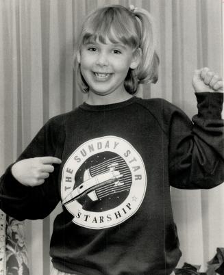 She's a winner!, Elizabeth Cummings, 9, of Mississauga proudly shows off the Starship sweatshirt she won with our Monsters contest