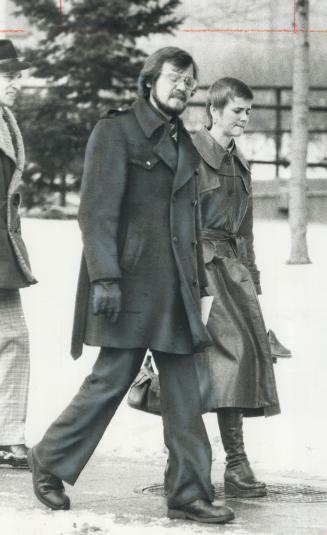 Whitby nurse Shelly Marie Van Ast, 23, and her husband walked grimly from county court in Toronto today after Mrs