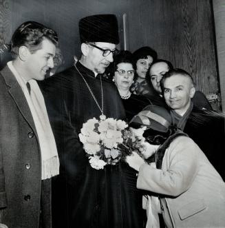 Flowers For Their Leader. Metropolitan Athenagoras returned from trip to Holy Land Saturday and was welcomed by the Greek Arthodox community at St. Ge(...)