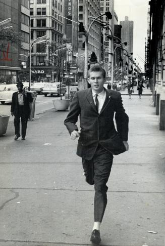 Fastest Canadian. The first Canadian to run the mile in less than four minutes - Dave Bailey, 21, of Toronto had to triumph over blindness in one eye and two leg fractures in 1962