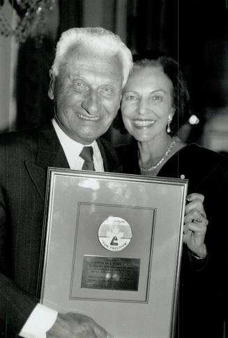 Bata a shoe-in for award, Thomas Bata and his wife, Sonja, display the Colin M