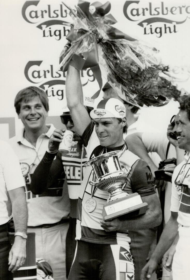 Bauer roars to victory, Canada's premier cyclist Steve Bauer (right) celebrates his victory in yesterday's Carlsberg Light Grand Prix around Queen's P(...)