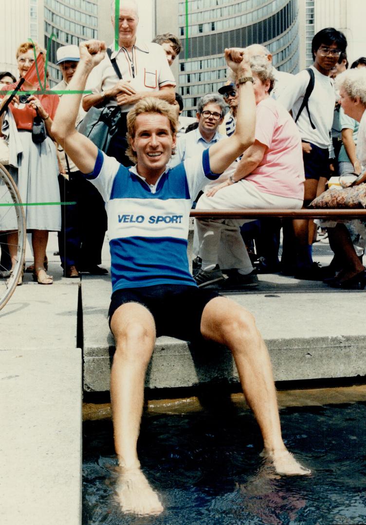 Richard Beecroft's around-the-world cycling odyssey came full circle when he broke through a white-ribbon at Nathan Phillips Square yesterday. Arms ra(...)