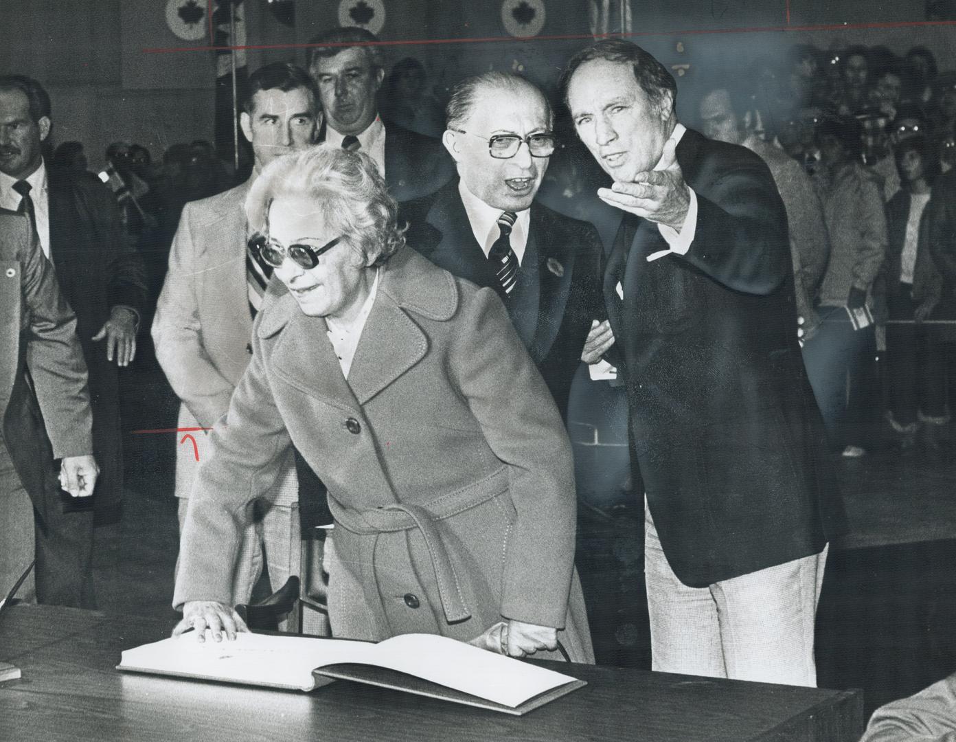 Menachem Begin and wife, Aliza, are escorted by Prime Minister Trudeau on arrival last night