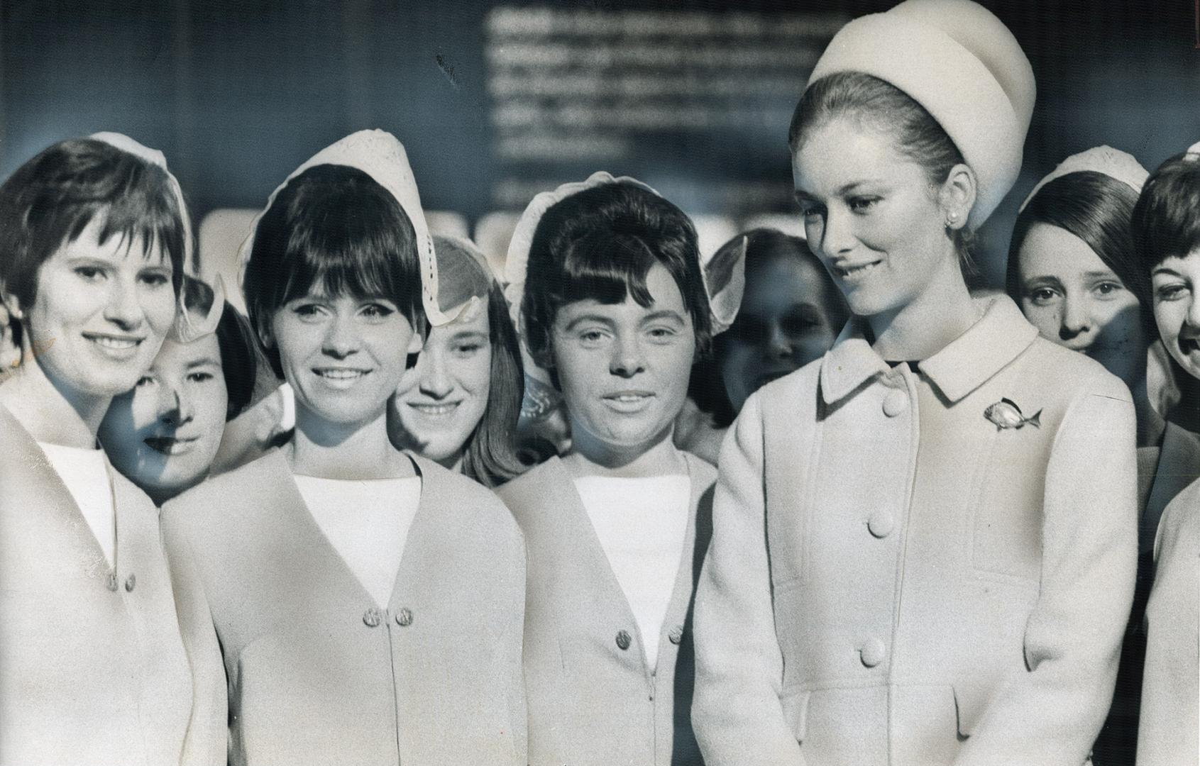 Princess Paola of Belgium talks with guides in Belgian pavilion at Expo, which her husband, Prince Albert, has offered to Montreal after fair closes. (...)