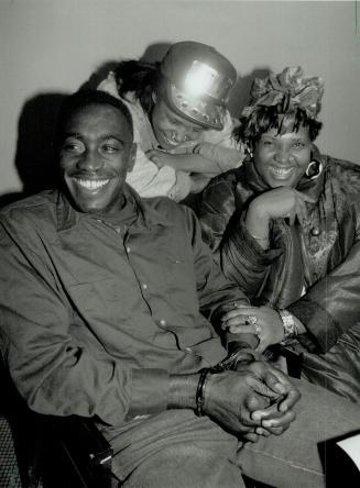 Jamaica-Bound: Robert Blackwood chats with girlfriend Sharon Vessel and friend Hot Blood D, centre, after withdrawing claim for refugee status