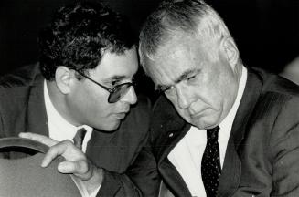 Nova chairman Bob Blair confers with lawyer Brian Levitt, while Polysar chief Bernard Isautier sits deep in thought during proceedings