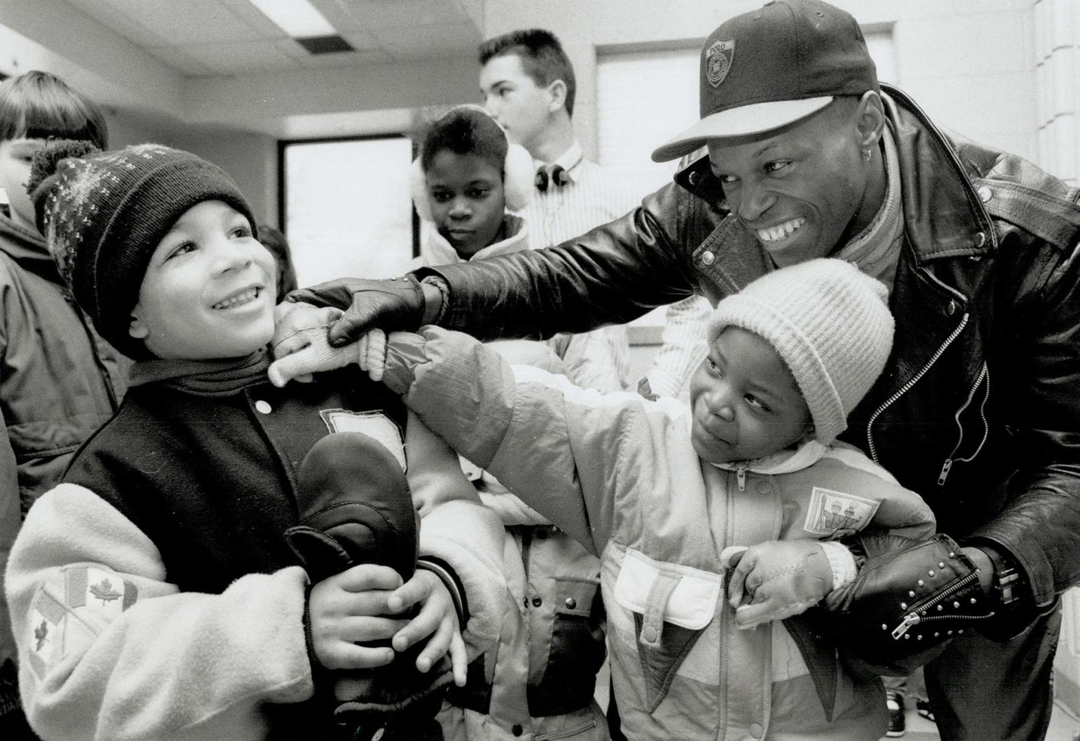 Donovan Boucher's a hit with the Kids, Donovan Boucher, Canadian and Commonwealth welterweight champ, stopped in at the Regent Park Community Centre y(...)