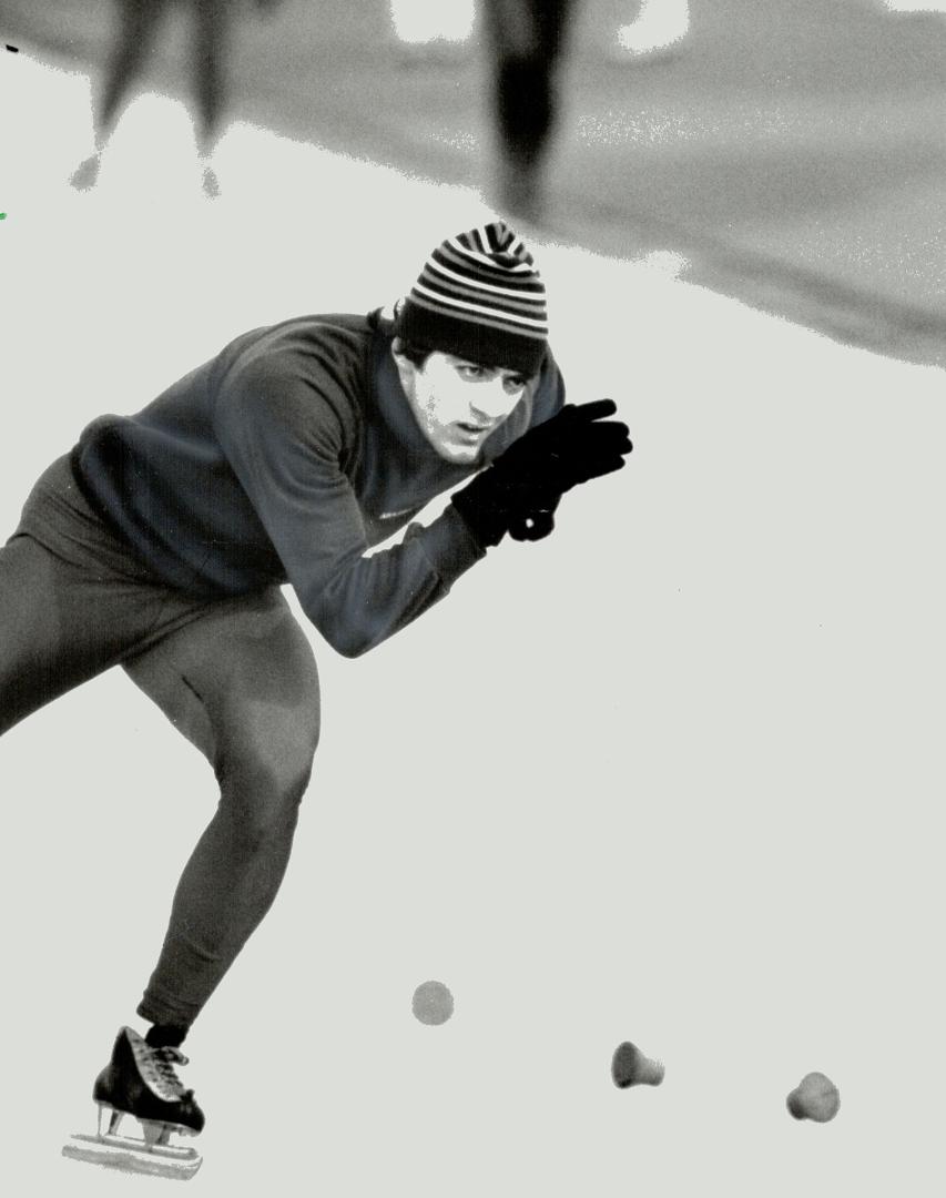 Golden boy: Quebecer Gaetan Boucher won Canada's first gold medal of these Winter Olympics today, blazing to victory in the 1,000-metre speedskating race