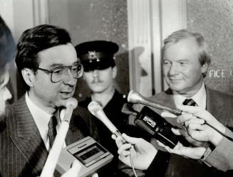 Queens Park talks: Quebec Liberal leader Robert Bourassa talks to reporters after his meeting with Premier William Davis yesterday