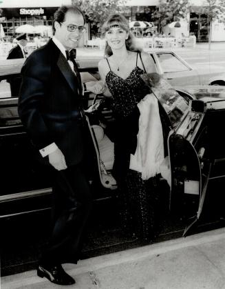 A celebrity entrance: World-renowned classical guitarist Liona Boyd and her escort, Joel Bell, last night were among glamorous audicence who attended Met Opera concert