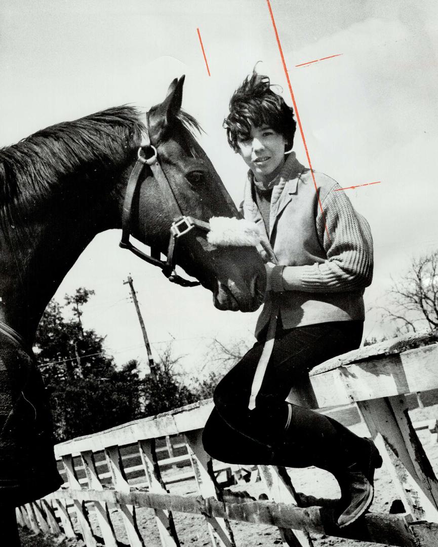 19-Year-old Chris Hanson has written a book about her horse, Bonheur, She received a bouquet Saturday night when the Bonacres Equestrian Centre opened in Newmarket