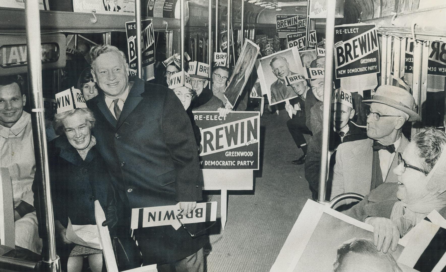 Andy Brewin NDP candidate in Greenwood, his wife (left) and supporters Ride special street car to the Gardens, They later heard Douglas says: I could (...)