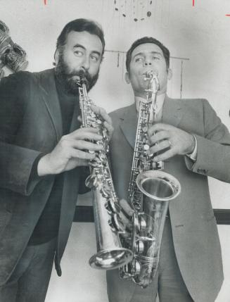 Getting in tune for saxophone convention, bearded Paul Brodie of Toronto and Jean-Marie Londeix of France rehearse new tune for event which starts Friday