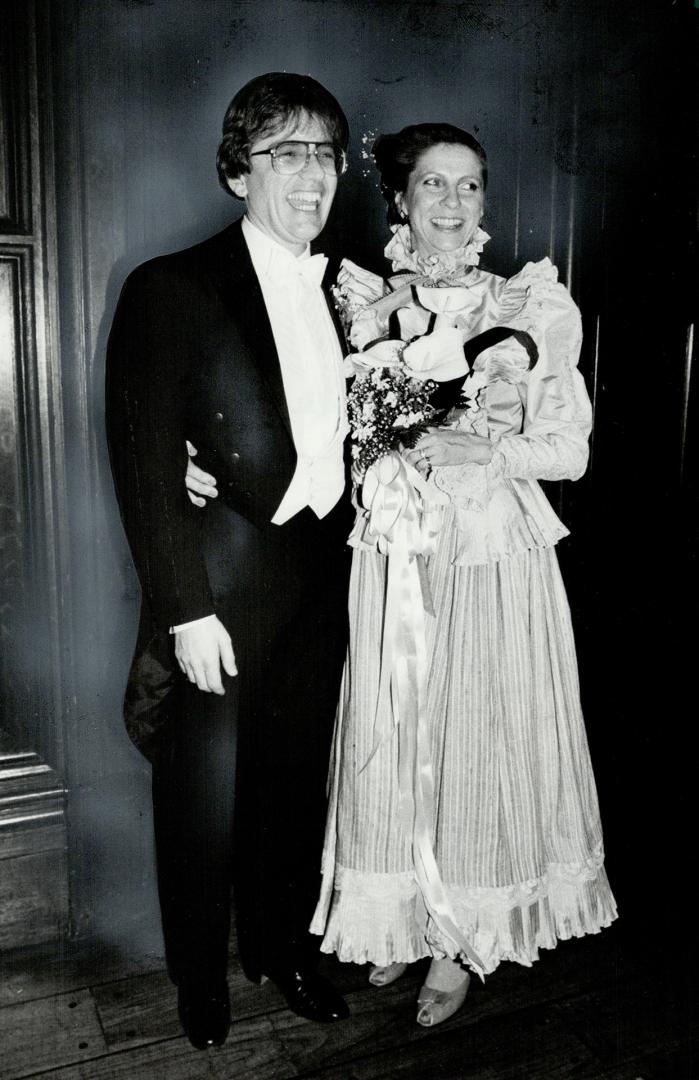 In a May to December romance with a modern twist, beaming bride Marilyn Brooks, right, poses with her brand-new husband Kennedy John Lachlan Coles