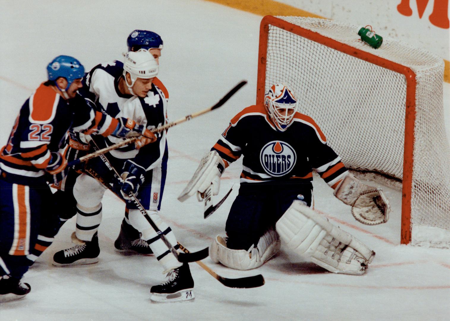 Aaron Broten in front of net