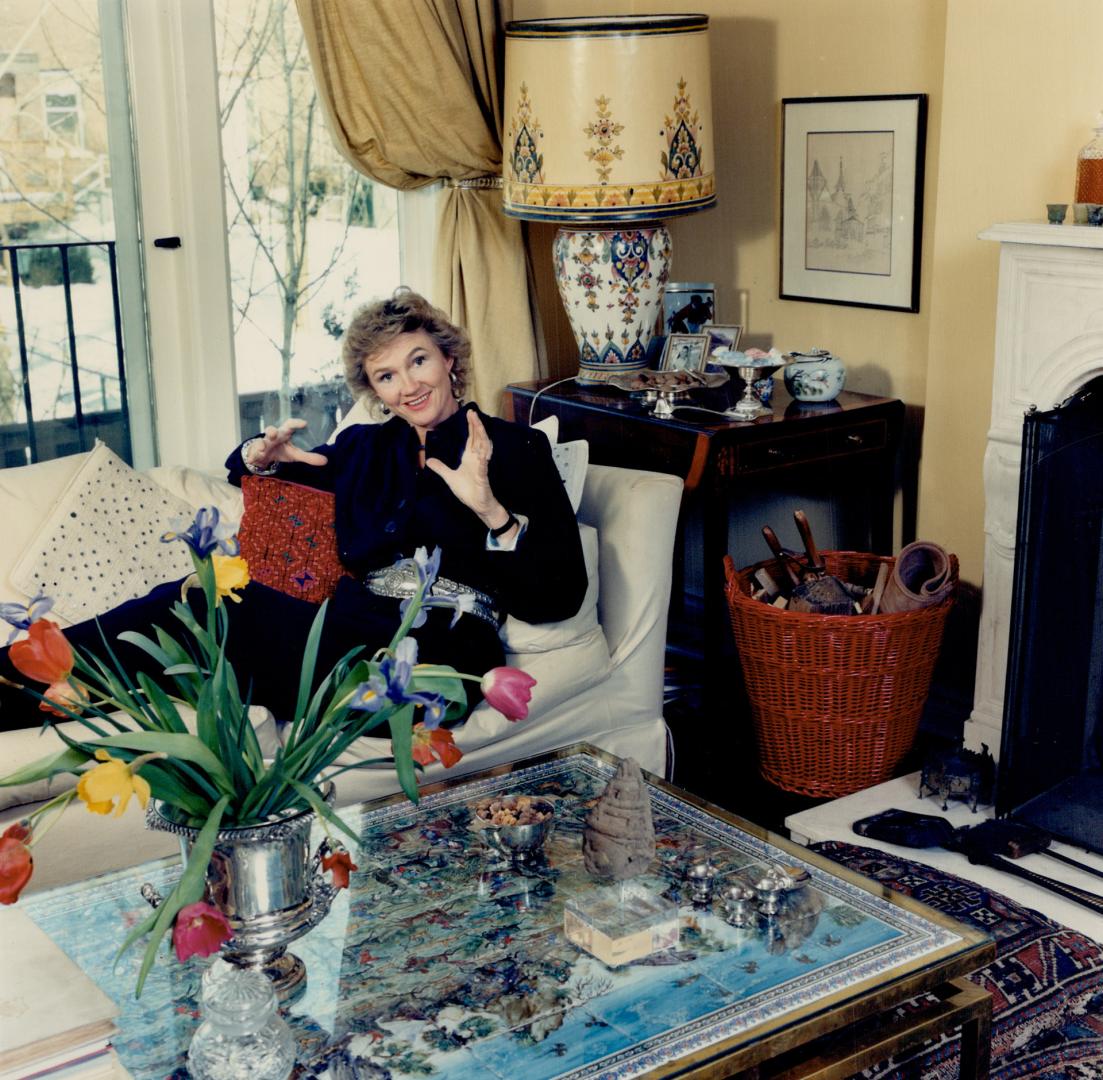 News anchor and former foreign correspondent Hilary Brown relaxes in her living room on a sofa covered with Irish linen from a bolt bought for $60 from a junk merchant in Nicosia