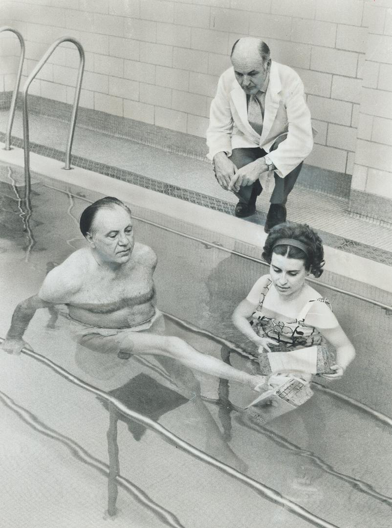 Horace Brown, former alderman, at Toronto Western Hospital with physiotherapist Glenda Duncan, under the supervision of Dr. John Crawford