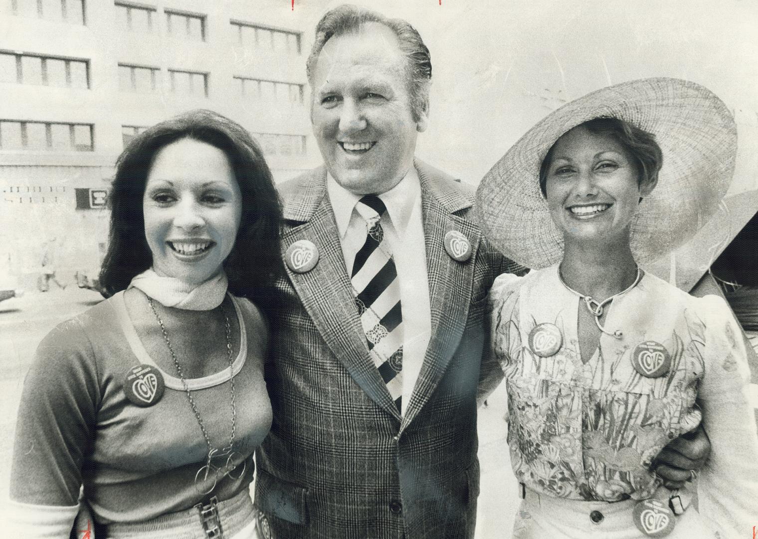 They all love Toronto so these three wear their What ever happened to love? buttons proudly