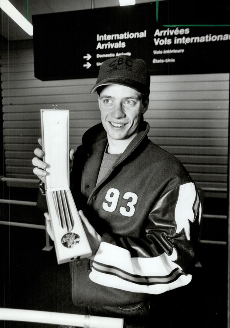 Golden boy: Kurt Browning shows off his figure skating gold medal