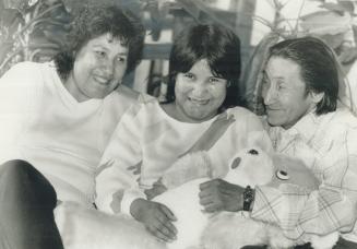 Mom Phyllis Bruce (centre) is all smiles and so are grandparents Annie and Daniel Bruce as they wait at Ronald McDonald House in London, Ont., to give(...)