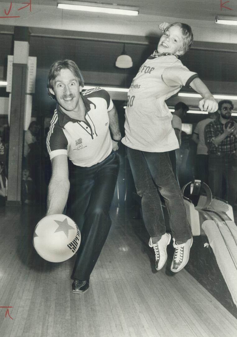 Sure strike, Forward Brian Budd of Toronto Blizzard takes aim with soccer ball as he participates in bowling event sponsored by Big Brothers of Peel i(...)