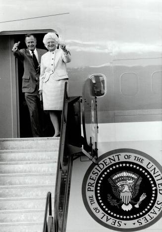 Hi, Canada: U.S. President George Bush and his wife. Barbara, leave Air Force One after it taxied to a secure area of Pearson International Airport yesterday