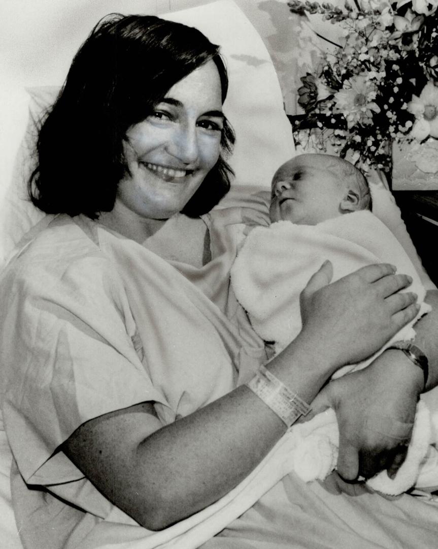 City Hall's first baby. Alderman Joanne Campbell became the first elected official in Toronto's history to give birth while in office. She holds son, (...)