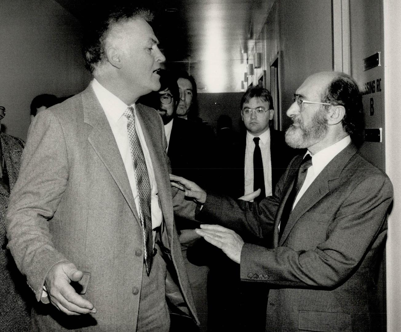 Speaking out: Rev. Ken Campbell, left, founder of Choose Life Canada, and pro-choice Dr. Henry Morgentaler exchange heated words last night in a corri(...)