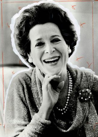 Kitty Carlisle's merriment explodes in a wonderful cascade of hilarity