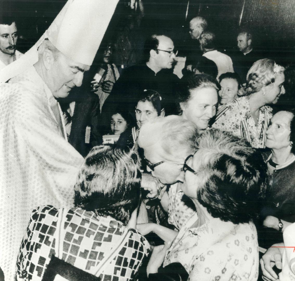 Toronto's Cardinal Carter is greeted by parishioners of Santa Maria In Transpontina church