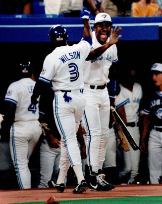 Joe Carter and Mookie Wilson