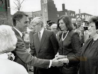 A handshake from Portugal. Anibal Cavaco Silva, the visiting Portuguese prime minister, greets a visitor yesterday in Toronto. He is accompanied by Pr(...)