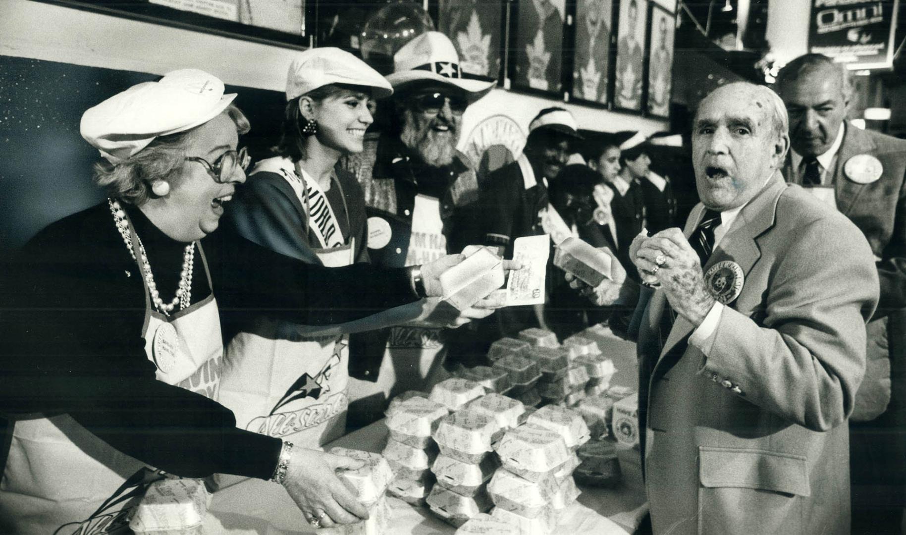 Toronto Maple Leafs vice-president King Clancy put the bite on a Big Mac yesterday at the Gardens to help raise money for Ronald McDonald House - a ne(...)