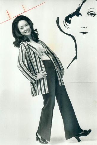 Adrienne Clarkson, TV hostess. Cruise look features striped blazer