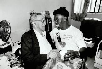 Fan flips for pinball. An appreciative Herb Poulter welcomes Toronto Argonaut Mike (Pinball) Clemons into his downtown home yesterday. Clemons, voted (...)