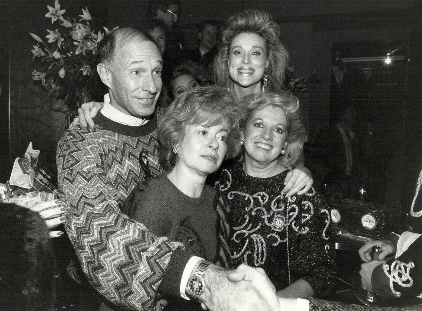 Having a good time, clockwise from left, George Cohon, Kimberly Turner, Susan Cohon and Connie Foley