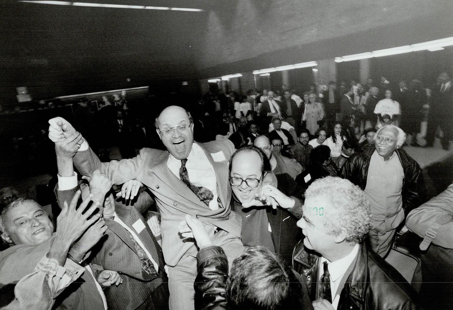 Joyful winner: David Collenette, victor in the Don Valley East Liberal nomination battle, is carried aloft by supporters