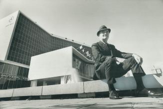 Mayor Vic Copps sits in front of Hamilton's new city hall surveying Lloyd D