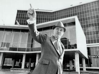 Striking changes and a new spirit are evident in Hamilton, where Mayor Vic Copps stands in front of the city hall