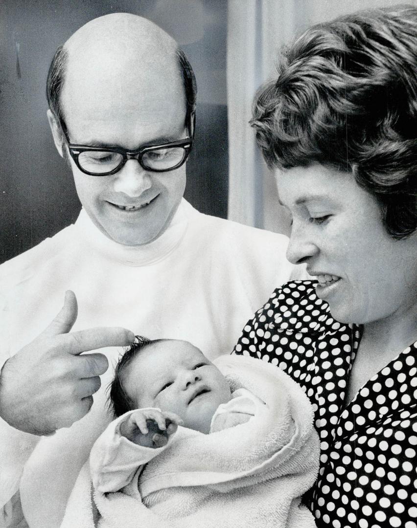 The Cosgroves have a girl. Mayor Paul Cosgrove of Scarborough and his wife, Farnces, admire their new daughter, Cara Elizabeth, born Saturday at St. M(...)